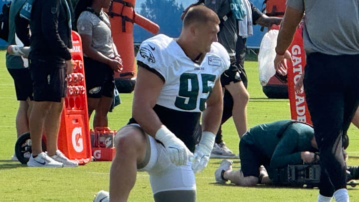 Eagles rookie defensive tackle Ty Robinson gets loose before a training camp practice.