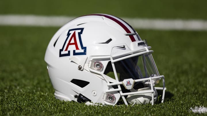 Nov 25, 2022; Tucson, Arizona, USA; Detailed view of an Arizona Wildcats helmet on the field during the Territorial Cup at Arizona Stadium. Mandatory Credit: Mark J. Rebilas-Imagn Images