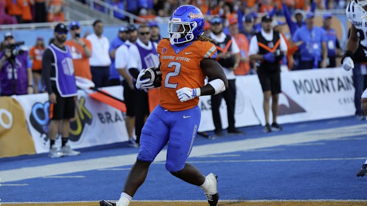 Oct 5, 2024; Boise, Idaho, USA; Boise State Broncos running back Ashton Jeanty (2) scores a touchdown during the first half against the Utah State Aggies at Albertsons Stadium. Mandatory Credit: Brian Losness-Imagn Images
