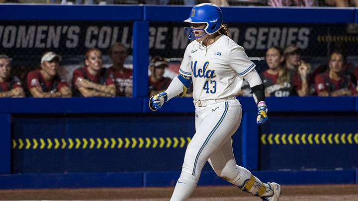 May 29, 2026; Oklahoma City, OK, USA; UCLA Bruins utility Megan Grant (43) yells as she heads towards home plate after hitting a three-run home run in the second inning against the Arkansas Razorbacks during the NCAA Women’s College World Series at Devon Park. Mandatory Credit: Brett Rojo-Imagn Images May 29, 2026; Oklahoma City, OK, USA; UCLA Bruins utility Megan Grant (43) yells as she heads towards home plate after hitting a three-run home run in the second inning against the Arkansas Razorbacks during the NCAA Women’s College World Series at Devon Park. Mandatory Credit: Brett Rojo-Imagn Images