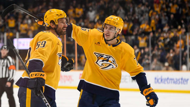 Nov 27, 2024; Nashville, Tennessee, USA;  Nashville Predators defenseman Roman Josi (59) celebrates after his goal with and defenseman Brady Skjei (76) during the first period against the Philadelphia Flyers at Bridgestone Arena. Mandatory Credit: Steve Roberts-Imagn Images