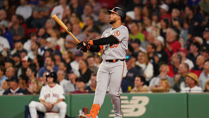 Sep 11, 2024; Boston, Massachusetts, USA; Baltimore Orioles designated hitter Anthony Santander (25) hits a home run against the Boston Red Sox in the eighth inning at Fenway Park. Sep 11, 2024; Boston, Massachusetts, USA; Baltimore Orioles designated hitter Anthony Santander (25) hits a home run against the Boston Red Sox in the eighth inning at Fenway Park.