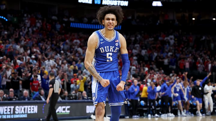 Mar 29, 2024; Dallas, TX, USA; Duke basketball guard Tyrese Proctor (5) reacts after defeating the