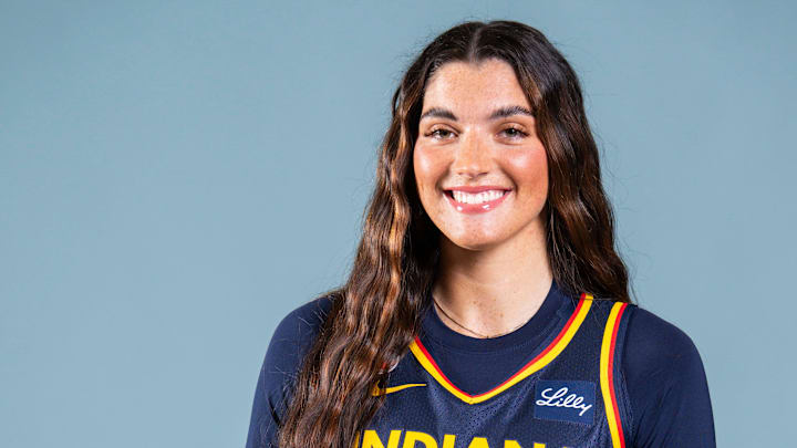 Indiana Fever forward Justine Pissott (13) poses for a photo Wednesday, April 22, 2026, during media day at Gainbridge Fieldhouse in Indianapolis.