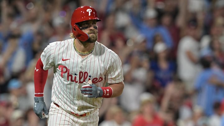 Jun 1, 2024; Philadelphia, Pennsylvania, USA;   Philadelphia Phillies first base Bryce Harper (3) watches the ball leave the park on a two-run home run in the seventh inning against the St. Louis Cardinals at Citizens Bank Park. Philadelphia won 6-1. Mandatory Credit: John Geliebter-USA TODAY Sports