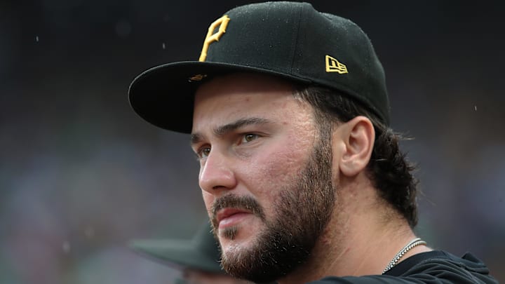 Jun 28, 2025; Pittsburgh, Pennsylvania, USA; Pittsburgh Pirates starting pitcher Paul Skenes (30) looks on from the dugout against the New York Mets during the second inning at PNC Park. Mandatory Credit: Charles LeClaire-Imagn Images