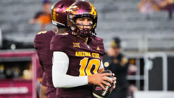 Sep 13, 2025; Tempe, Arizona, USA; Arizona State Sun Devils quarterback Sam Leavitt warms up before the game between Arizona State Sun Devils and Texas State Bobcats. Mandatory Credit: Arianna Grainey-Imagn Images