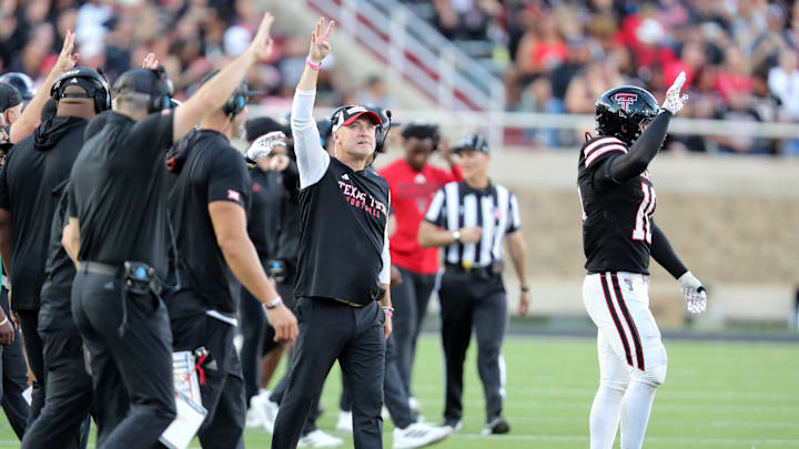 Nov 15, 2025; Lubbock, Texas, USA; Texas Tech Red Raiders head coach Joey McGuire signals the start of the fourth quarter against the Central Florida Knights at Jones AT&T Stadium. Mandatory Credit: Michael C. Johnson-Imagn Images Nov 15, 2025; Lubbock, Texas, USA; Texas Tech Red Raiders head coach Joey McGuire signals the start of the fourth quarter against the Central Florida Knights at Jones AT&T Stadium. Mandatory Credit: Michael C. Johnson-Imagn Images