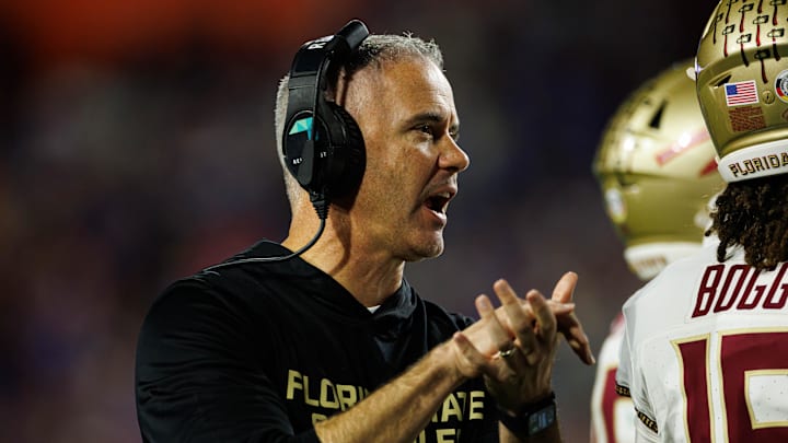 Nov 29, 2025; Gainesville, Florida, USA; Florida State Seminoles head coach Mike Norvell gestures against the Florida Gators during the second half at Ben Hill Griffin Stadium. Mandatory Credit: Matt Pendleton-Imagn Images