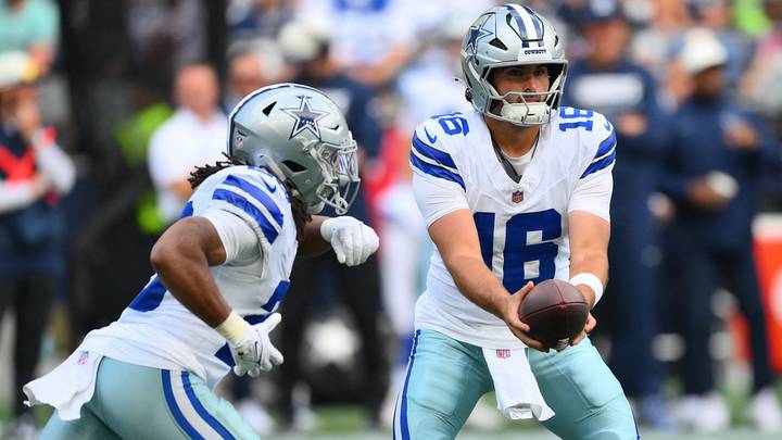 Dallas Cowboys quarterback Sam Howell (16) hands the ball off to Dallas Cowboys running back Jaydon Blue (23) during the first half at Lumen Field. Mandatory Credit: Steven Bisig-Imagn Images Dallas Cowboys quarterback Sam Howell (16) hands the ball off to Dallas Cowboys running back Jaydon Blue (23) during the first half at Lumen Field. Mandatory Credit: Steven Bisig-Imagn Images