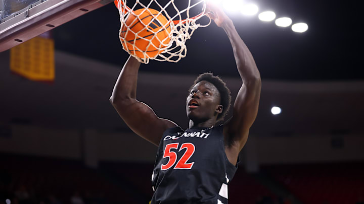 Jan 24, 2026; Tempe, Arizona, USA; Cincinnati Bearcats center Moustapha Thiam (52) dunks the ball against the Arizona State Sun Devils in the first half at Desert Financial Arena. Mandatory Credit: Mark J. Rebilas-Imagn Images