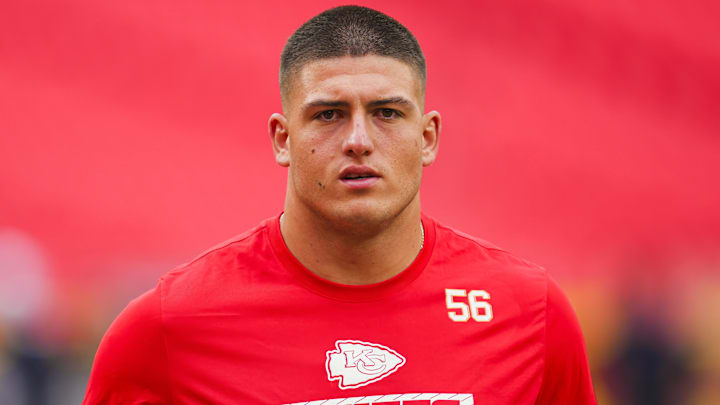 Aug 22, 2024; Kansas City, Missouri, USA; Kansas City Chiefs defensive end George Karlaftis (56) warms up prior to a game against the Chicago Bears at GEHA Field at Arrowhead Stadium. Mandatory Credit: Jay Biggerstaff-Imagn Images