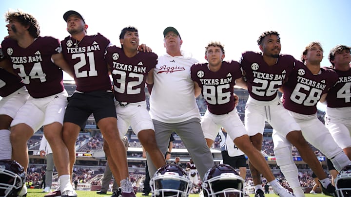 Sep 7, 2024; College Station, Texas, USA; Texas A&M Aggies head coach Mike Elko celebrates a 52-10 win against the McNeese State Cowboys at Kyle Field. Sep 7, 2024; College Station, Texas, USA; Texas A&M Aggies head coach Mike Elko celebrates a 52-10 win against the McNeese State Cowboys at Kyle Field.