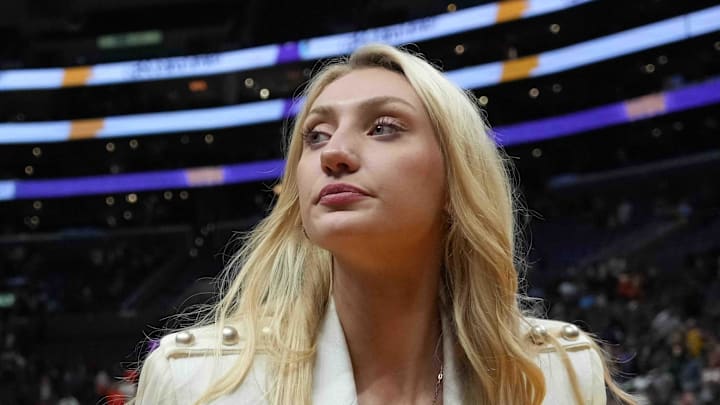 LA Sparks injured forward Cameron Brink leaves the floor after the game against the Las Vegas Aces at Crypto.com Arena.