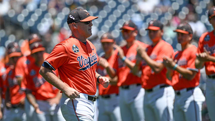 Jun 14, 2024; Omaha, NE, USA;  Virginia Cavalier head coach Brian O'Connor takes the field before the game against the North Carolina Tar Heels at Charles Schwab Filed Omaha. Mandatory Credit: Steven Branscombe-Imagn Images