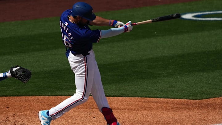 Texas Rangers third baseman Jonathan Ornelas bats against the Los Angeles Dodgers during the third inning at Surprise Stadium Texas Rangers third baseman Jonathan Ornelas bats against the Los Angeles Dodgers during the third inning at Surprise Stadium