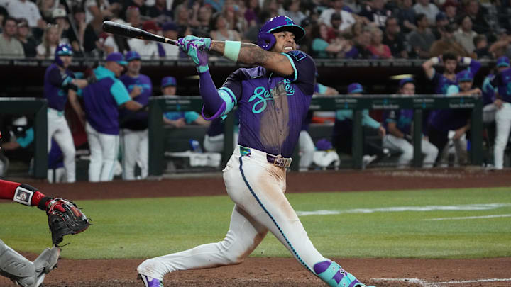 Sep 5, 2025; Phoenix, Arizona, USA; Arizona Diamondbacks second base Ketel Marte (4) hits against the Boston Red Sox in the eighth inning at Chase Field. Mandatory Credit: Rick Scuteri-Imagn Images Sep 5, 2025; Phoenix, Arizona, USA; Arizona Diamondbacks second base Ketel Marte (4) hits against the Boston Red Sox in the eighth inning at Chase Field. Mandatory Credit: Rick Scuteri-Imagn Images