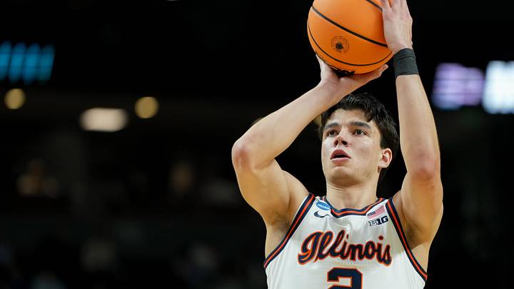 Mar 19, 2026; Greenville, SC, USA; Illinois Fighting Illini guard Andrej Stojakovic (2) shoots the ball against the Penn Quakers in the first half of a first round game of the men's 2026 NCAA Tournament at Bon Secours Wellness Arena. Mandatory Credit: Bob Donnan-Imagn Images