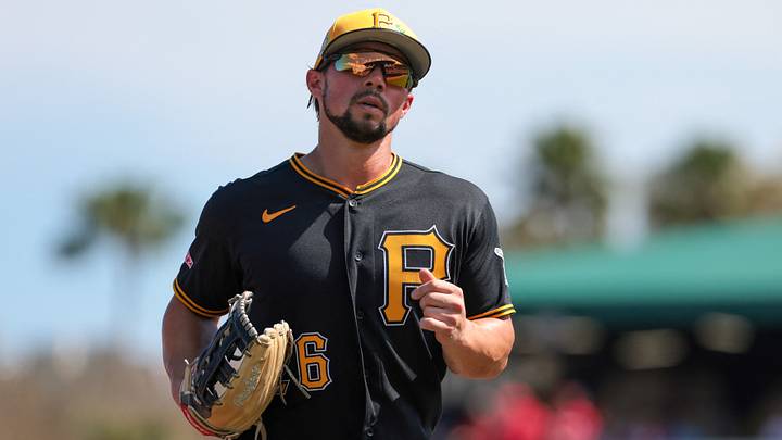 Mar 1, 2026; Jupiter, Florida, USA; Pittsburgh Pirates right fielder Dominic Fletcher (26) returns to the dugout against the St. Louis Cardinals during the second inning at Roger Dean Chevrolet Stadium. Mandatory Credit: Sam Navarro-Imagn Images