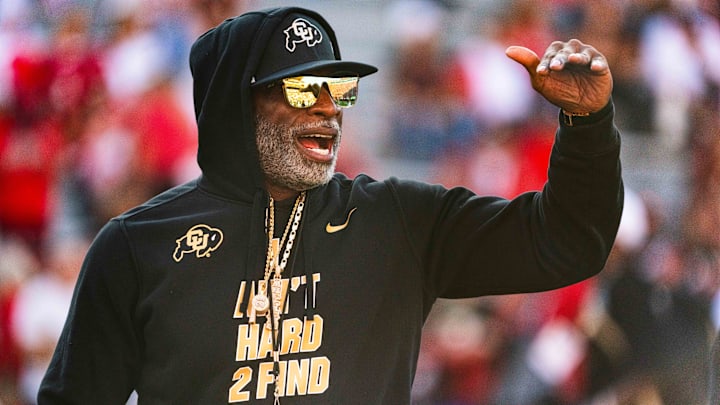 Colorado Buffaloes head coach Sanders watches warmups before the game against the Nebraska Cornhuskers at Memorial Stadium. 