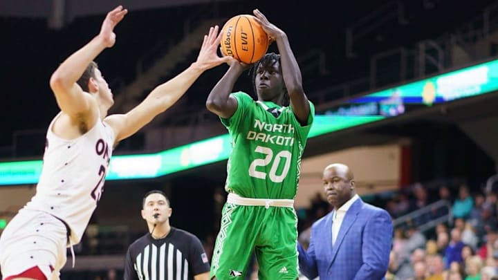 BJ Omot fires up a jump shot for North Dakota. BJ Omot fires up a jump shot for North Dakota.