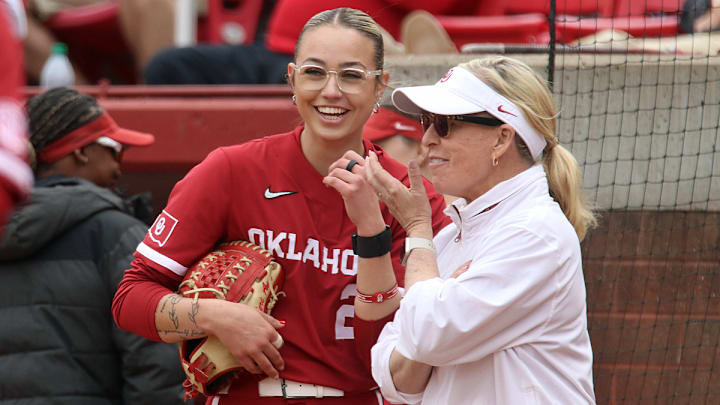 Oklahoma coach Patty Gasso and pitcher Sam Landry