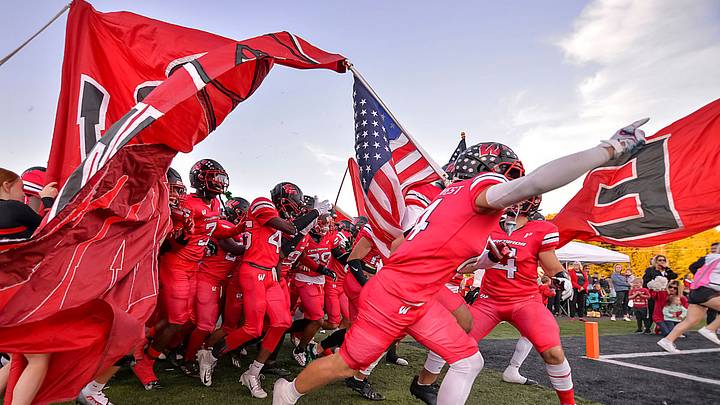 Lakota West High School football players take the field. Lakota West High School football players take the field.