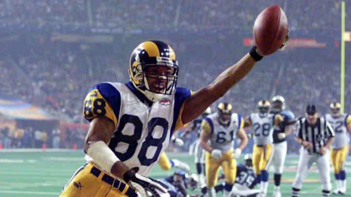 St. Louis Rams wide receiver Terry Holt (88) celebrates his touchdown pass reception against the Tennessee Titans during the third quarter of Super Bowl XXXIV inside the Georgia Dome Jan. 30, 2000. The 9-yard touchdown reception was the first touchdown of the game and gave the Rams a 16-0 lead.
Tennessee Titans Vs St Louis Rams In Super Bowl Xxxiv Football St. Louis Rams wide receiver Terry Holt (88) celebrates his touchdown pass reception against the Tennessee Titans during the third quarter of Super Bowl XXXIV inside the Georgia Dome Jan. 30, 2000. The 9-yard touchdown reception was the first touchdown of the game and gave the Rams a 16-0 lead.
Tennessee Titans Vs St Louis Rams In Super Bowl Xxxiv Football