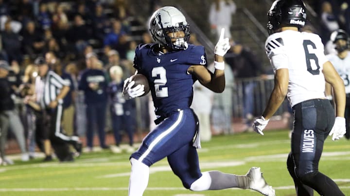 Junior running back LaMarcus Bell (24 carries for 245 yards and three touchdowns against Tualatin) is just one of the many players who make Lake Oswego a matchup nightmare for opponents.