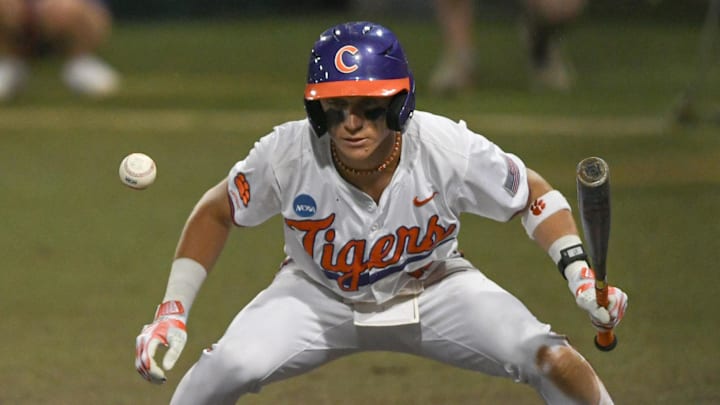 Jun 2, 2024; Clemson, South Carolina, USA; Clemson sophomore Cam Cannarella (10) watches a ball go by him on a pitch from Coastal Carolina University during the bottom of the eighth inning of the NCAA baseball Clemson Regional at Doug Kingsmore Stadium in Clemson. 