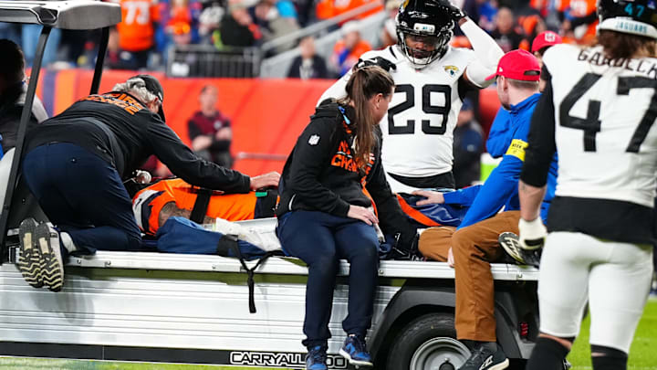 Dec 21, 2025; Denver, Colorado, USA; Denver Broncos wide receiver Pat Bryant (13) is taken off the field after an injury during the second at Empower Field at Mile High. 