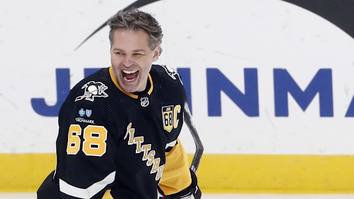 Feb 18, 2024; Pittsburgh, Pennsylvania, USA;  Pittsburgh Penguins former right wing Jaromir Jagr (68) reacts during warm-ups against the Los Angeles Kings at PPG Paints Arena. The Kings won 2-1. Mandatory Credit: Charles LeClaire-Imagn Images