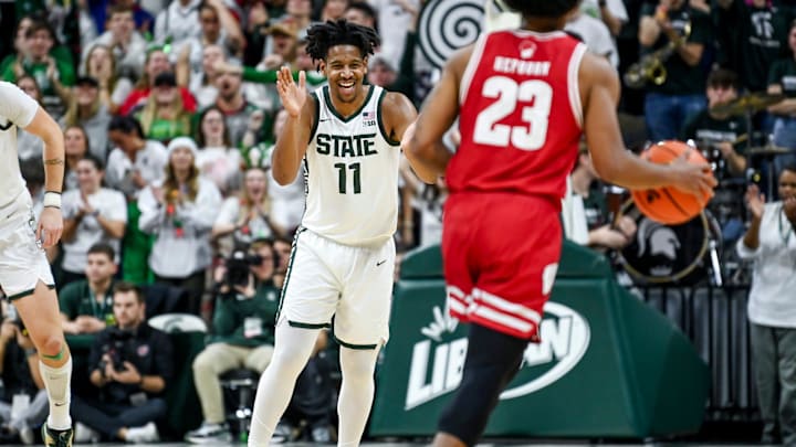 Michigan State's A.J. Hoggard celebrates after making a 3-pointer against Wisconsin during the