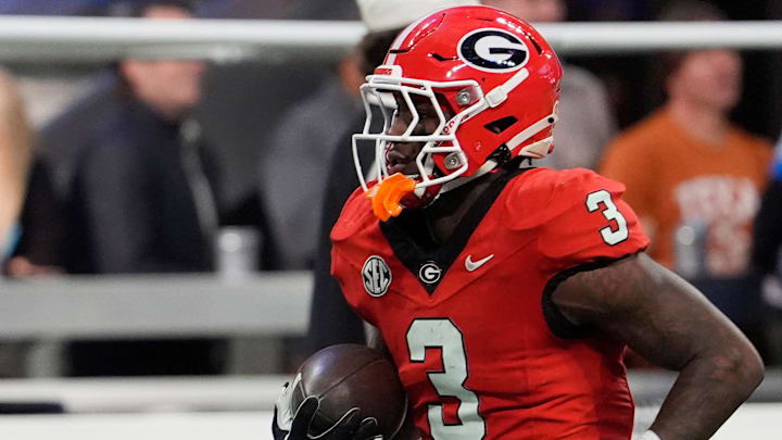 Georgia running back Nate Frazier (3) warms up before the start of the SEC championship game against Texas in Atlanta, on Saturday, Dec. 7, 2024.