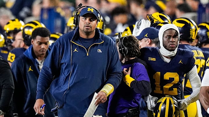 Michigan offensive line coach Grant Newsome looks on after a play against Michigan State during the first half at Michigan Stadium in Ann Arbor on Saturday, Oct. 26, 2024. Michigan offensive line coach Grant Newsome looks on after a play against Michigan State during the first half at Michigan Stadium in Ann Arbor on Saturday, Oct. 26, 2024.