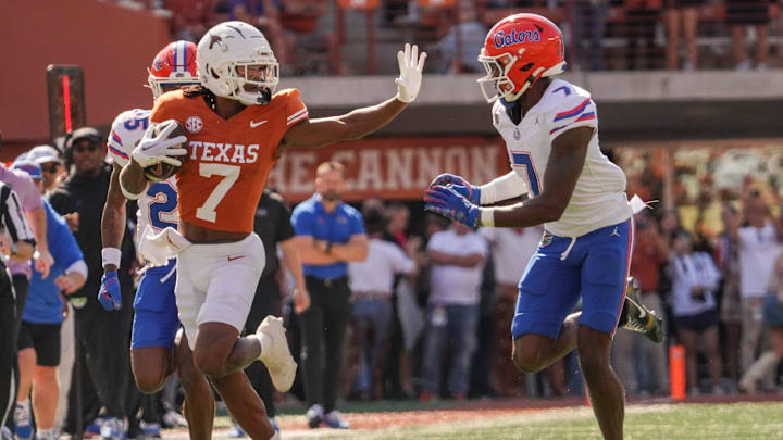 Texas Longhorns wide receiver Isaiah Bond (7) advances the ball as Florida Gators defensive back Trikweze Bridges (7) attempts to guard him during the Longhorns' game against the Florida Gators, Nov. 9, 2024 at Darrell K. Royal Texas Memorial Stadium in Austin.
