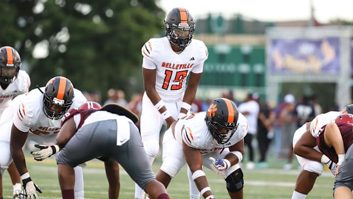 Belleville quarterback Bryce Underwood (19) calls for a snap against River Rouge during the first half of Prep Kickoff Classic at Wayne State University's Tom Adams Field in Detroi on Friday, August 25, 2023. Belleville quarterback Bryce Underwood (19) calls for a snap against River Rouge during the first half of Prep Kickoff Classic at Wayne State University's Tom Adams Field in Detroi on Friday, August 25, 2023.