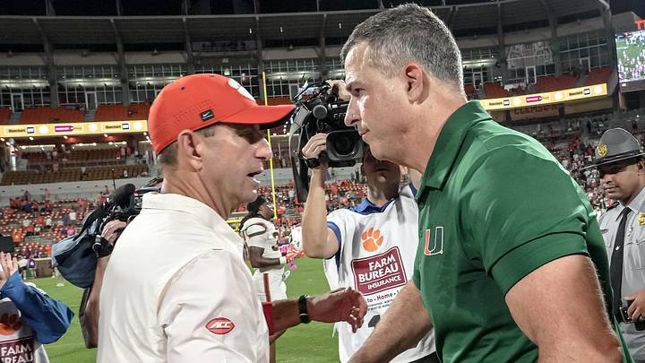 Clemson head coach Dabo Swinney shakes hands with Miami Hurricanes Head Coach Mario Cristobal after the game at Memorial Stadium Saturday, Saturday, October 3, 2026. Clemson head coach Dabo Swinney shakes hands with Miami Hurricanes Head Coach Mario Cristobal after the game at Memorial Stadium Saturday, Saturday, October 3, 2026.