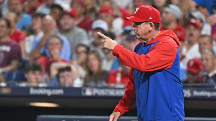 Oct 4, 2025; Philadelphia, Pennsylvania, USA; Philadelphia Phillies manager Rob Thomson (49) signals to the bullpen during the seventh inning against the Los Angeles Dodgers during game one of the NLDS round for the 2025 MLB playoffs at Citizens Bank Park. Oct 4, 2025; Philadelphia, Pennsylvania, USA; Philadelphia Phillies manager Rob Thomson (49) signals to the bullpen during the seventh inning against the Los Angeles Dodgers during game one of the NLDS round for the 2025 MLB playoffs at Citizens Bank Park.