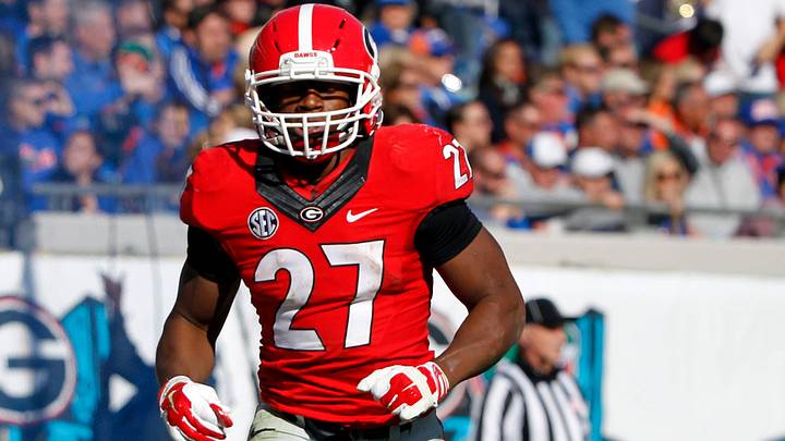Nov 1, 2014; Jacksonville, FL, USA; Georgia Bulldogs running back Nick Chubb (27) runs back to the bench after he scored a touchdown against the Florida Gators during the first quarter at EverBank Field. Mandatory Credit: Kim Klement-USA TODAY Sports Nov 1, 2014; Jacksonville, FL, USA; Georgia Bulldogs running back Nick Chubb (27) runs back to the bench after he scored a touchdown against the Florida Gators during the first quarter at EverBank Field. Mandatory Credit: Kim Klement-USA TODAY Sports