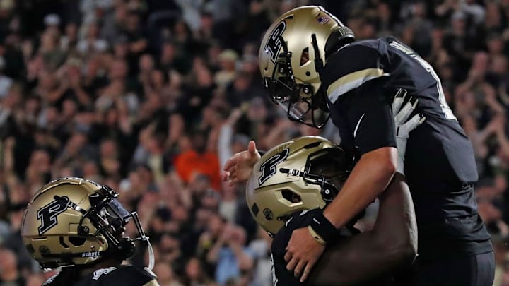 Purdue Boilermakers quarterback Hudson Card celebrates 