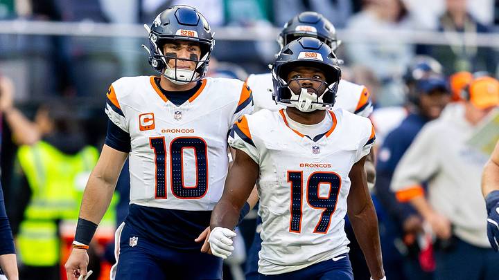 Denver Broncos v New York Jets International Series 12 10 2025. International Series Denver Broncos Wide receiver Marvin Mims (19) and Denver Broncos Quarterback Bo Nix (10) walk off pitch during the International Series match between Denver Broncos and New York Jets at Tottenham Hotspur Stadium, London, United Kingdom on 12 October 2025. 