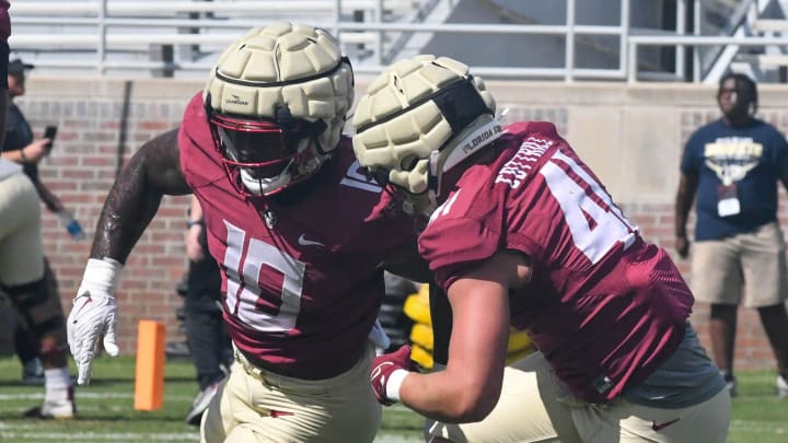 Florida State football players take part in drills during an FSU spring football practice of the 2023 season on Thursday, April 6, 2023 in Doak Campbell Stadium.

Dj Lundy 1 Of 1