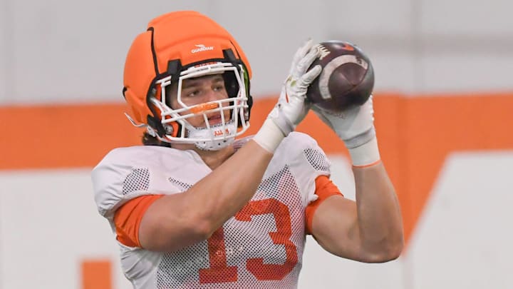 Clemson defensive end Will Heldt (13) catches a ball during the football practice at the Allen N. Reeves Football Complex at Clemson University in Clemson, S.C. Wednesday, March 5, 2025.