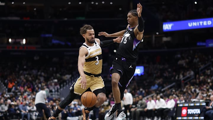 Mar 5, 2026; Washington, District of Columbia, USA; Washington Wizards guard Trae Young (3) drives to the basket as Utah Jazz forward Cody Williams (5) defends in the first half at Capital One Arena. Mandatory Credit: Geoff Burke-Imagn Images