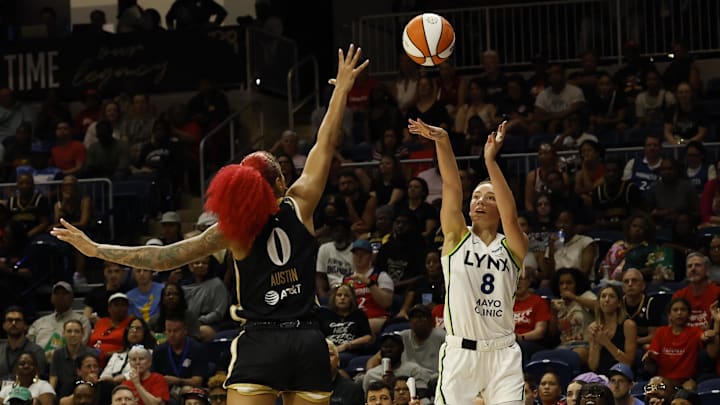 Jun 24, 2025; Washington, District of Columbia, USA; Minnesota Lynx forward Alanna Smith (8) shoots the ball over Washington Mystics forward Shakira Austin (0) in the second half at Entertainment & Sports Arena. Mandatory Credit: Geoff Burke-Imagn Images