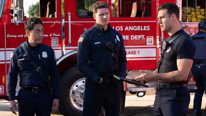 9-1-1: “War” - Following Hen’s firing, Chimney grapples with his decision and how it has affected the team. Meanwhile, a new AI call center assistant, meant to help, has begun to create more complications, and the 118 must intervene. THURSDAY, JAN. 15 (8:00-9:00 p.m. EST) on ABC. (Disney/Christopher Willard) 
KENNETH CHOI, OLIVER STARK, RYAN GUZMAN