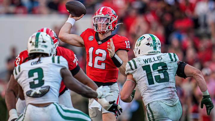 Nov 22, 2025; Athens, Georgia, USA; Georgia Bulldogs quarterback Ryan Puglisi (12) passes the ball against the Charlotte 49ers during the second half at Sanford Stadium. Mandatory Credit: Dale Zanine-Imagn Images