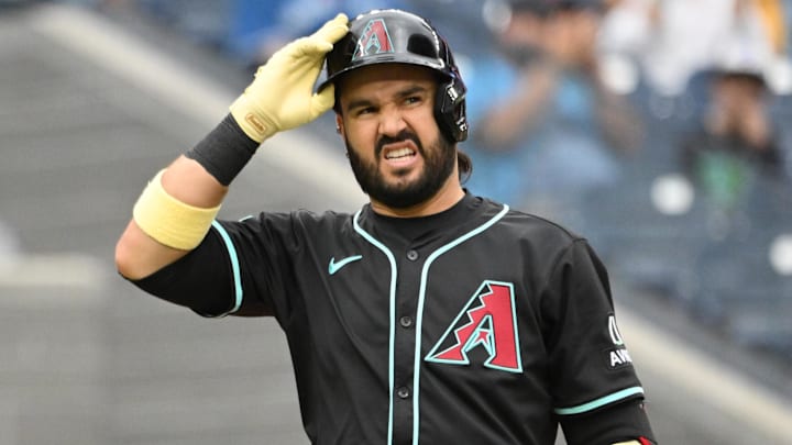 Jun 19, 2025; Toronto, Ontario, CAN;  Arizona Diamondbacks third baseman Eugenio Suarez (28) reacts after striking out against the Toronto Blue Jays in the ninth inning at Rogers Centre. Mandatory Credit: Dan Hamilton-Imagn Images