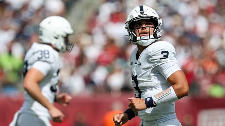 Penn State Nittany Lions quarterback Rocco Becht (3) runs off the field against the Temple Owls at Lincoln Financial Field. Penn State Nittany Lions quarterback Rocco Becht (3) runs off the field against the Temple Owls at Lincoln Financial Field.